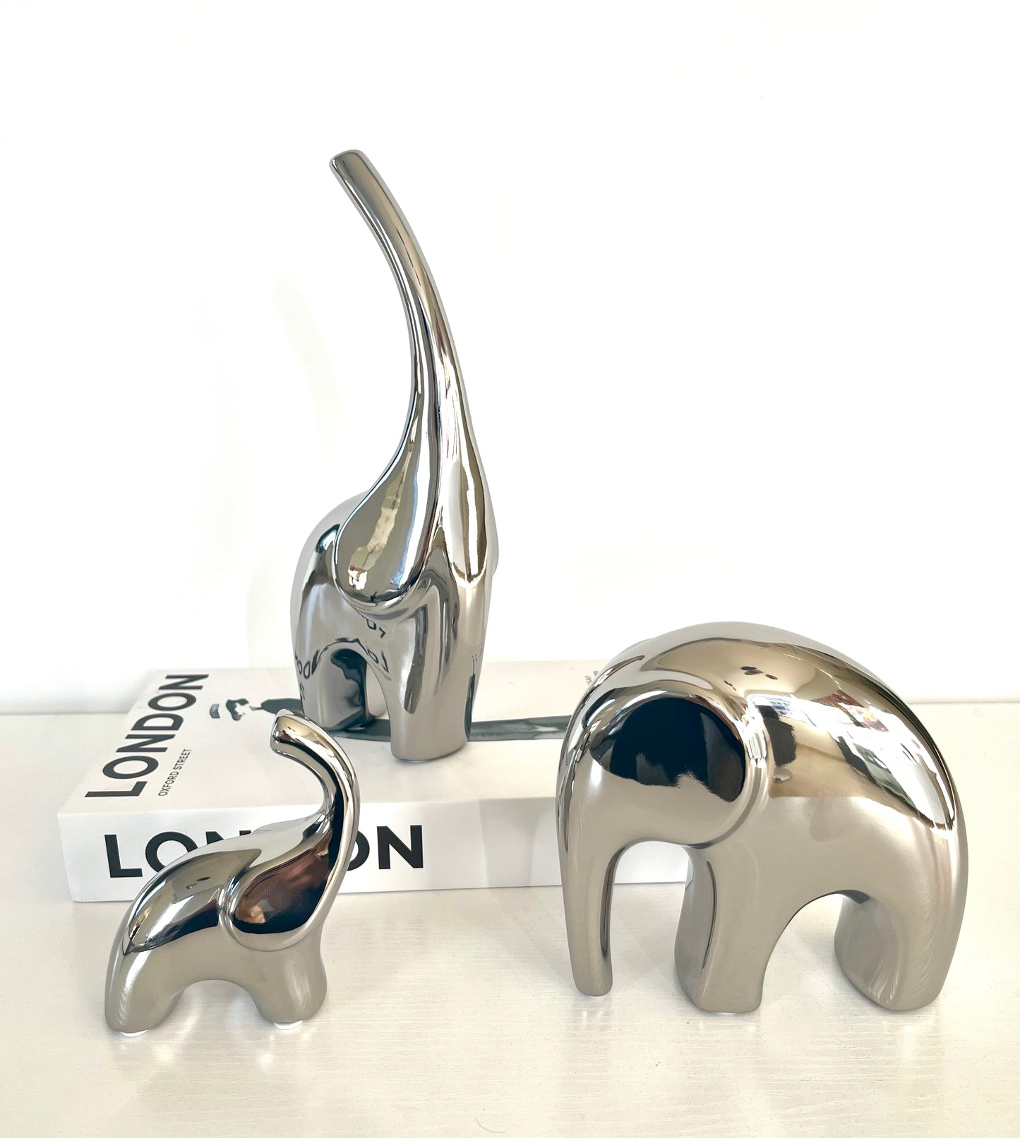 Enchanting Trio Elephant Statues